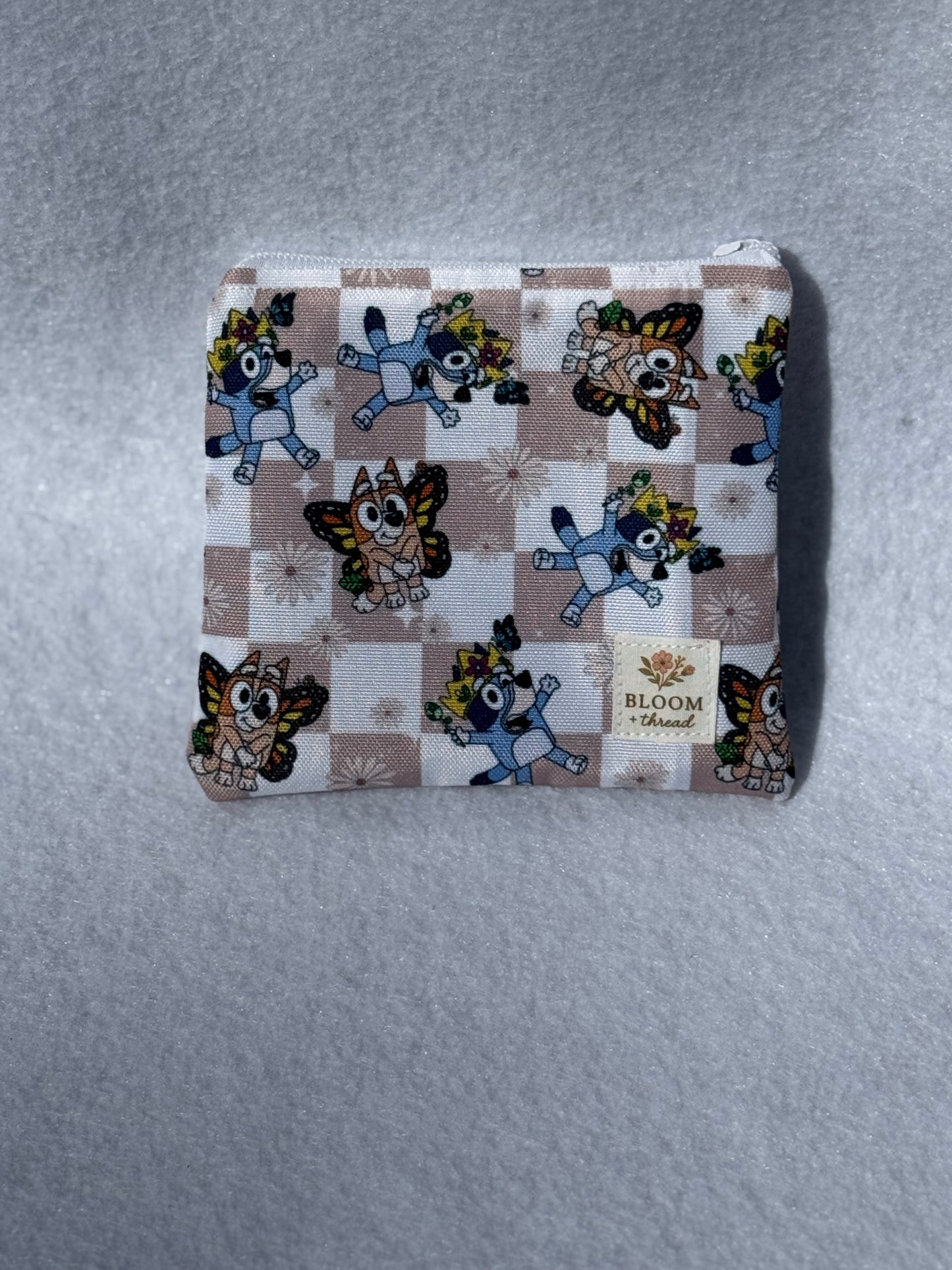 Limited Heeler Butterflies Pouch